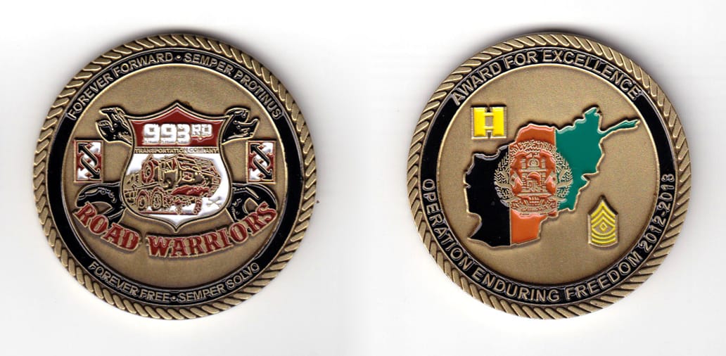 Round shaped coin, antique brass in color, 2 inches in diameter.