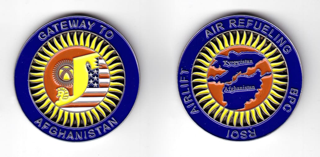 Round shaped coin, pewter in color, 1 31/32 inches in diameter.