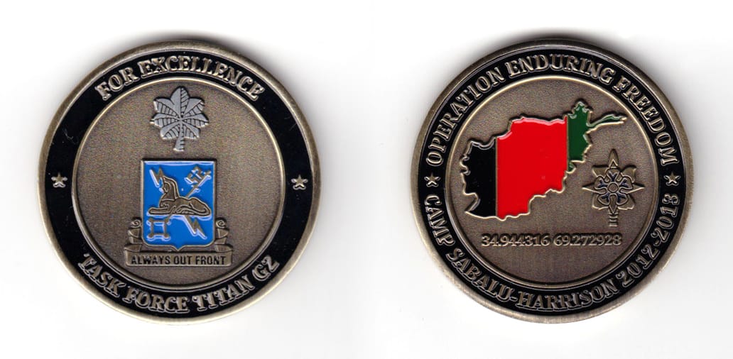 Round shaped coin, antique brass in color, 1 3/4 inches in diameter.