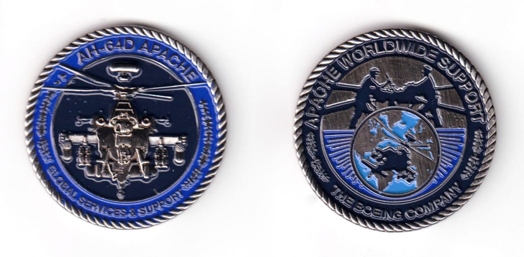 Round shaped coin, pewter in color, 1 47/64 inches in diameter.