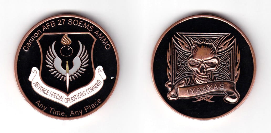 Round shaped coin, brass in color, 1 3/4 inches in diameter.