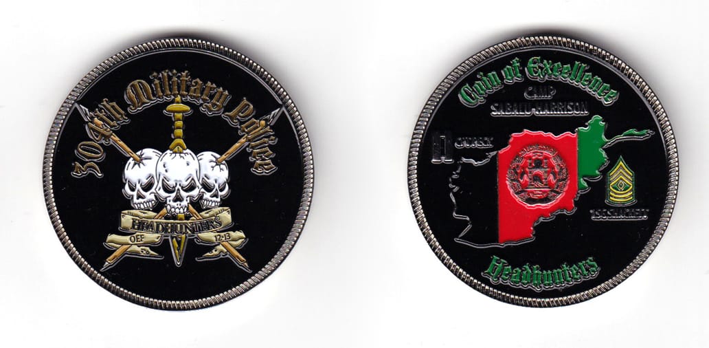 Round shaped coin, silver in color, 1 49/64 inches in color.