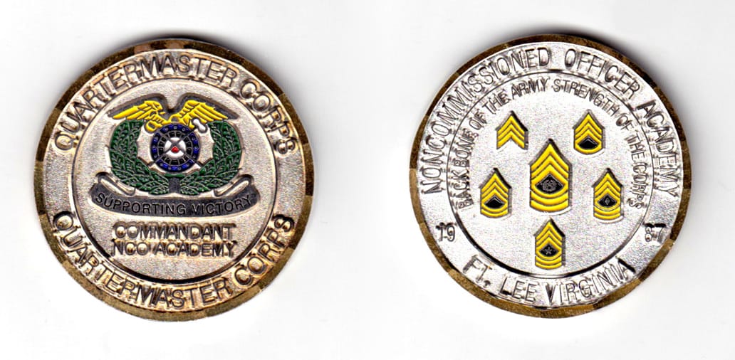 Round shaped coin, silver in color, 1 49/64 inches in diameter.