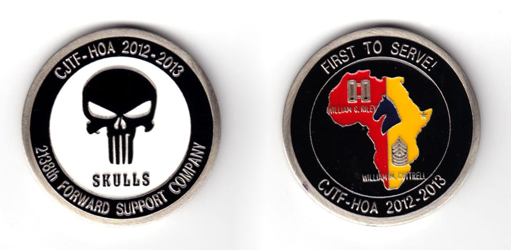 Round shaped coin, pewter in color, 1 45/64 inches in diameter.