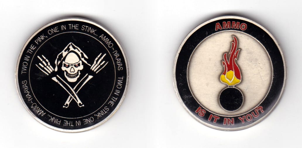 Round shaped coin, pewter in color, 1 19/32 inches in diameter.