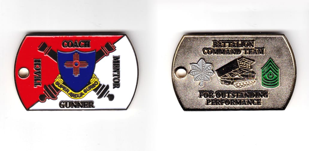 Rectangular shaped coin with short sides rounded, brass in color, 1 35/64 inches high x 2 1/2 inches wide.