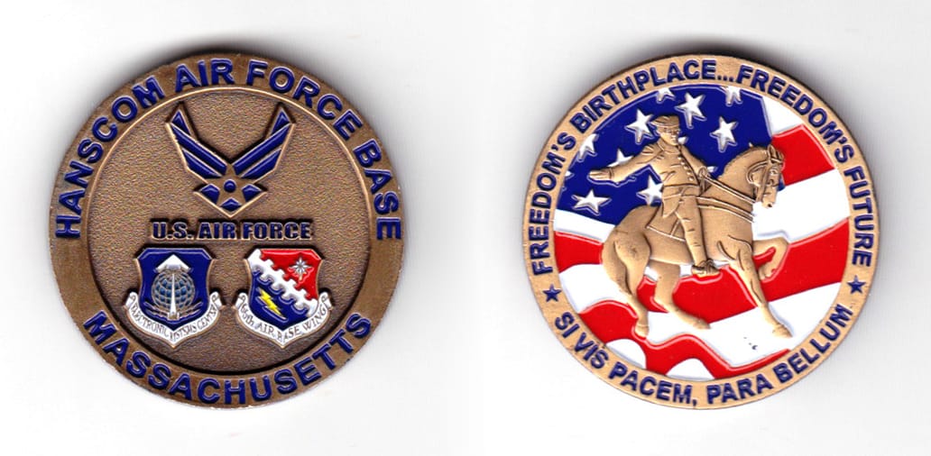 Round shaped coin, antique brass in color, 1 1/2 inches in diameter.