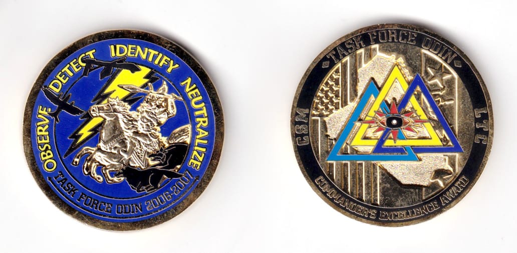 Round shaped coin, brass in color, 1 63/64 inches in diameter.