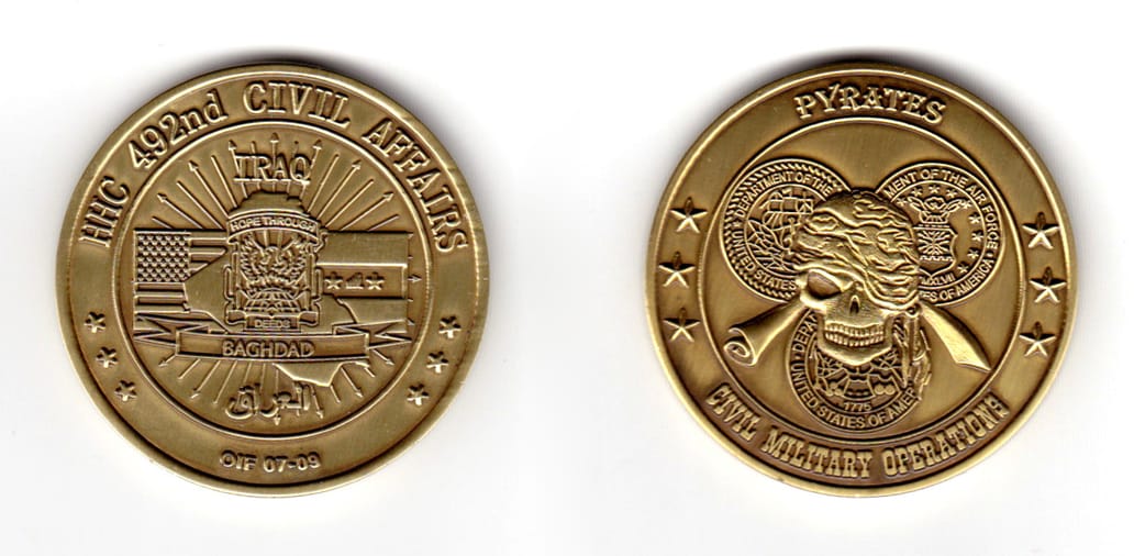 Round shaped coin, antique brass in color, 1 3/4 inches in diameter.