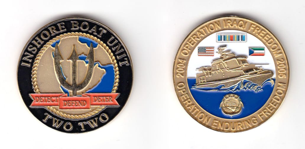 Round shaped coin, brass in color, 1 43/64 inches in diameter.