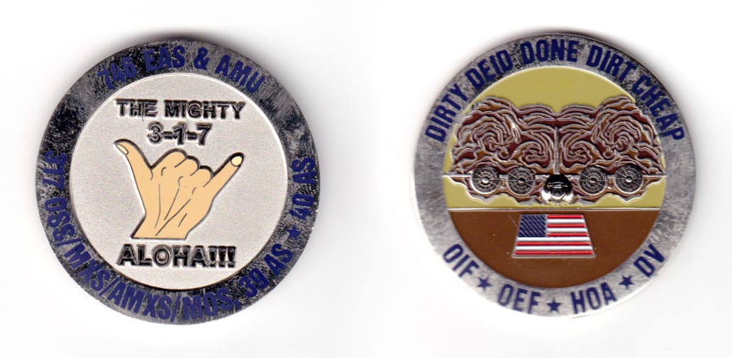 Round shaped coin, pewter in color, 1 51/64 inches in diameter.