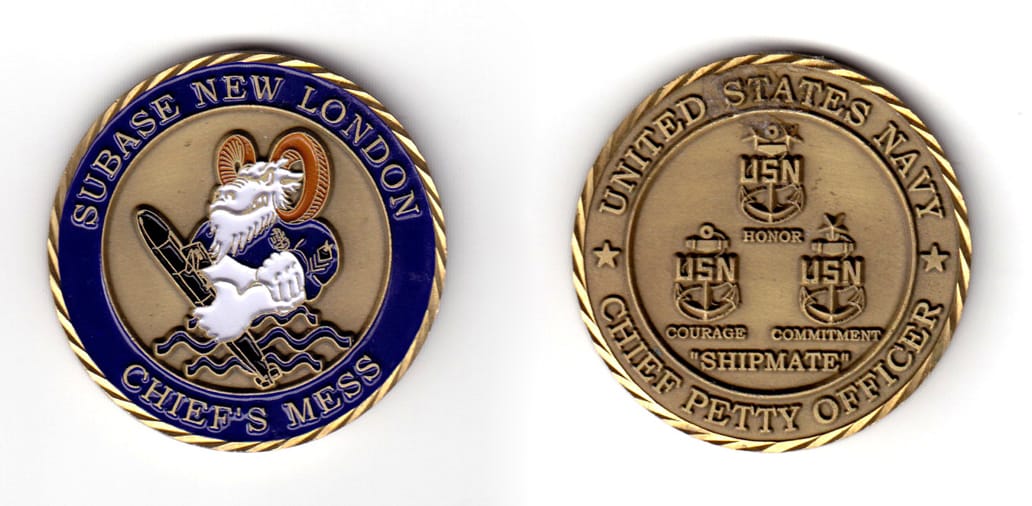 Round shaped coin, anique brass in color, 1 3/4 inches in diameter.