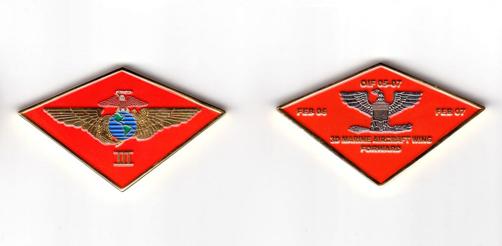 Diamond shaped coin, brass in color, 1 5/8 inches high x 2 45/64 inches wide.