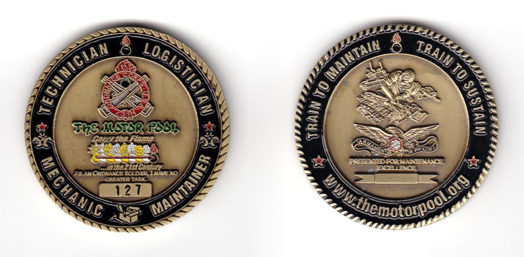 Round shaped coin, antique brass in color, 1 25/32 inches in diameter.