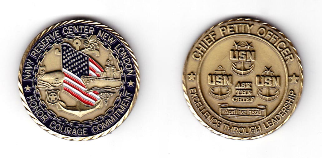 Round shaped coin, antique brass in color, 1 25/32 inches in diameter.