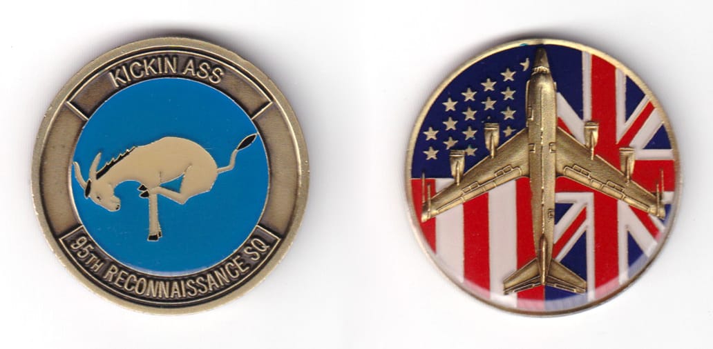 Round shaped c oin, antique brass in color, 1 37/64 inches in diameter.