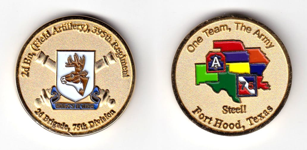 Round shaped coin, brass in color, 1 33/64 inches in diameter.