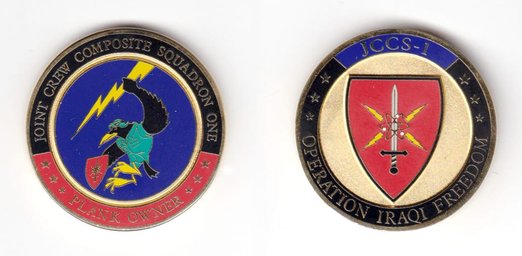 Round shaped coin, brass in color, 1 1/2 inches in diameter.