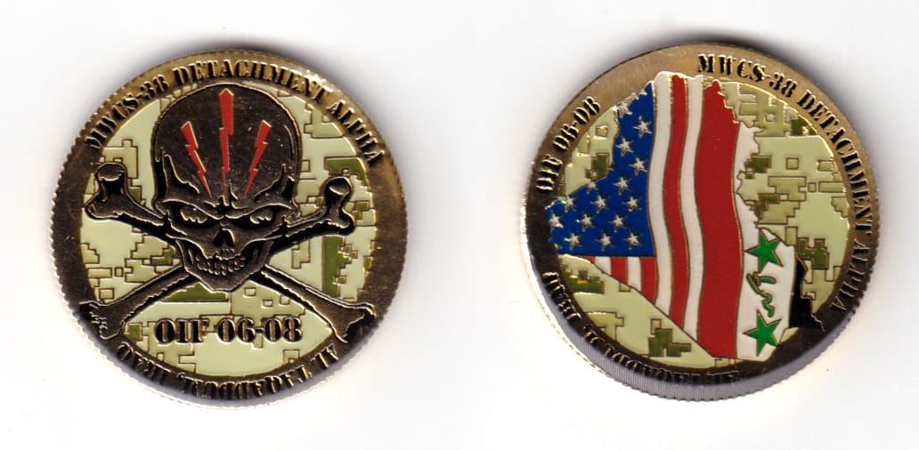 Round shaped coin, brass in color, 1 33/64 inches in diameter.