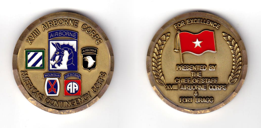 Round shaped coin, antique brass in color, 1 31/32 inches in diameter.