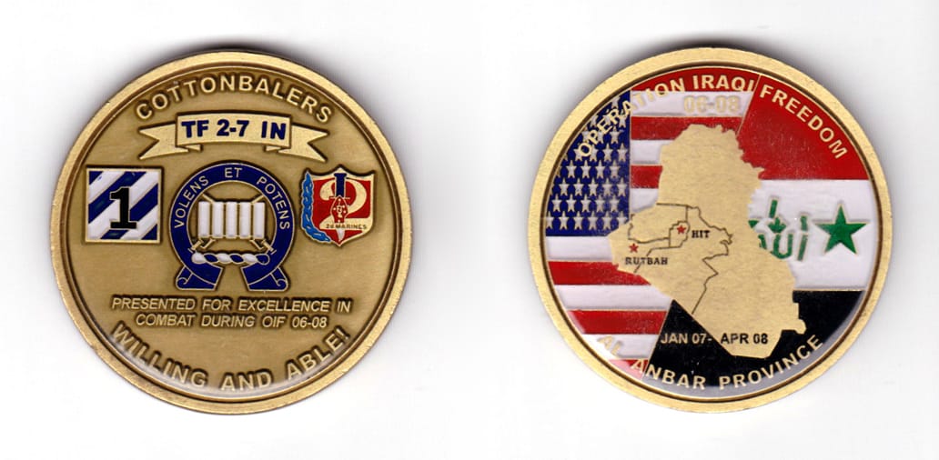 Round shaped coin antique brass in color, 1  3/4 inches in diameter.