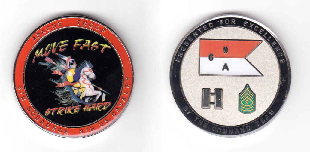 Round shaped coin, pewter in color, 1 63/64 inches in diameter.