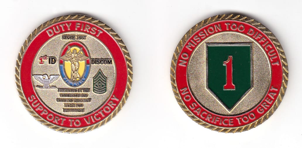 Round shaped coin, brass in color, 1 31/32 inches in diameter.