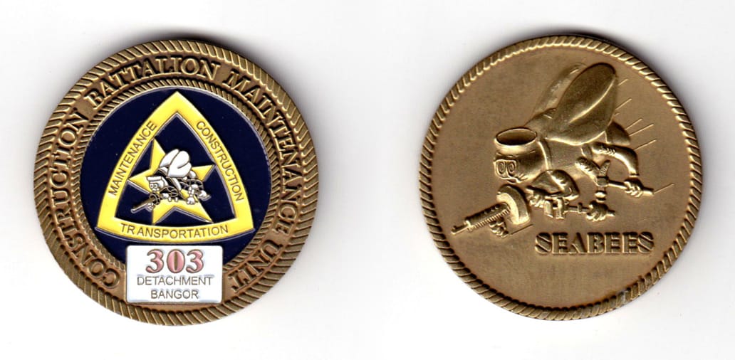 Round shaped coin, antique brass in color, 1 47/64 inches in diameter.