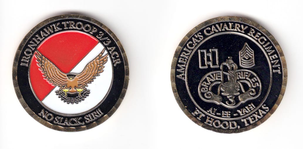 Round shaped coin, brass in color, 1 3/4 inches in diameter.