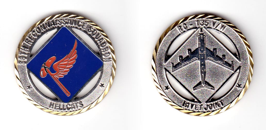 Round shaped coin, gold in color, 1 3/4 inches in diameter.