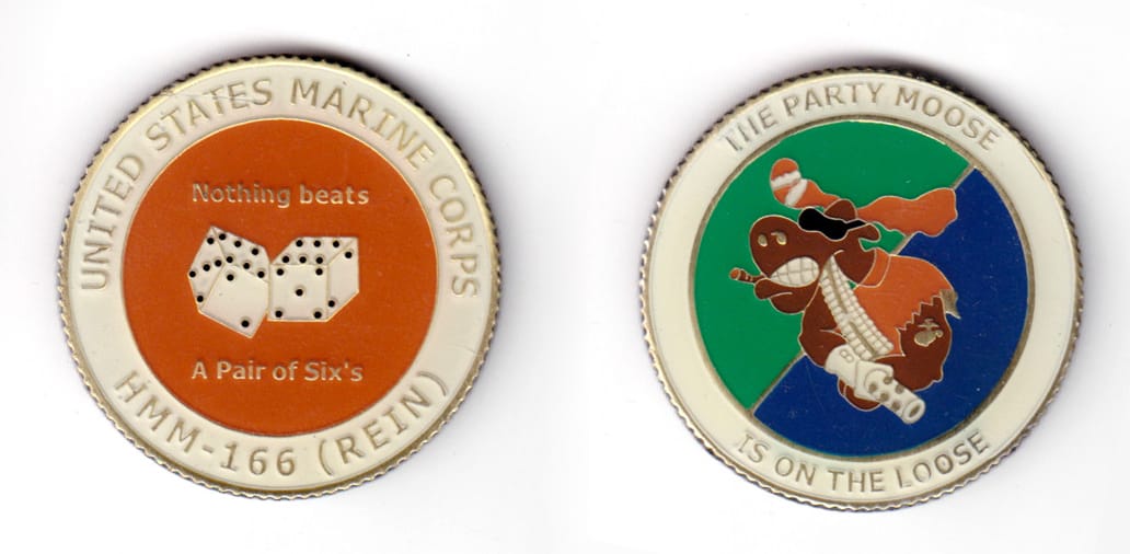 Round shaped coin, antique brass in color, 1 47/64 inches in diameter.