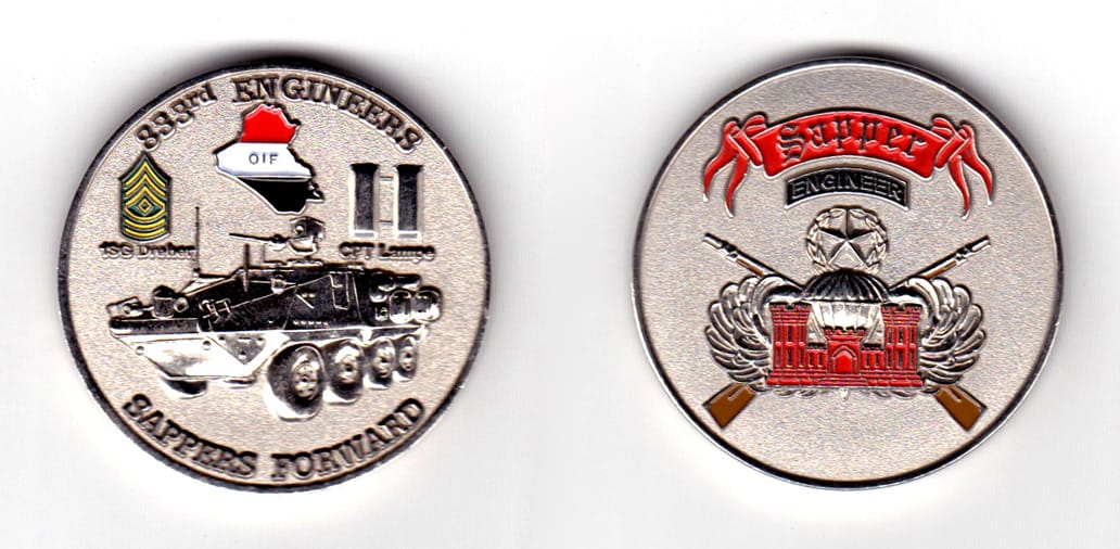 Round shaped coin, silver in color, 1 11/16th inches in diameter.