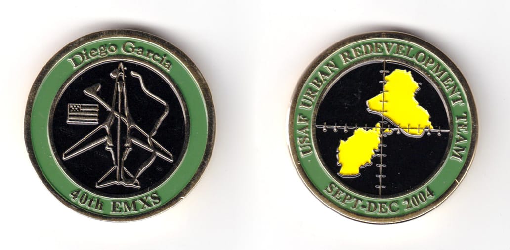 Round shaped coin, brass in color, 1 11/16 inches in diameter.