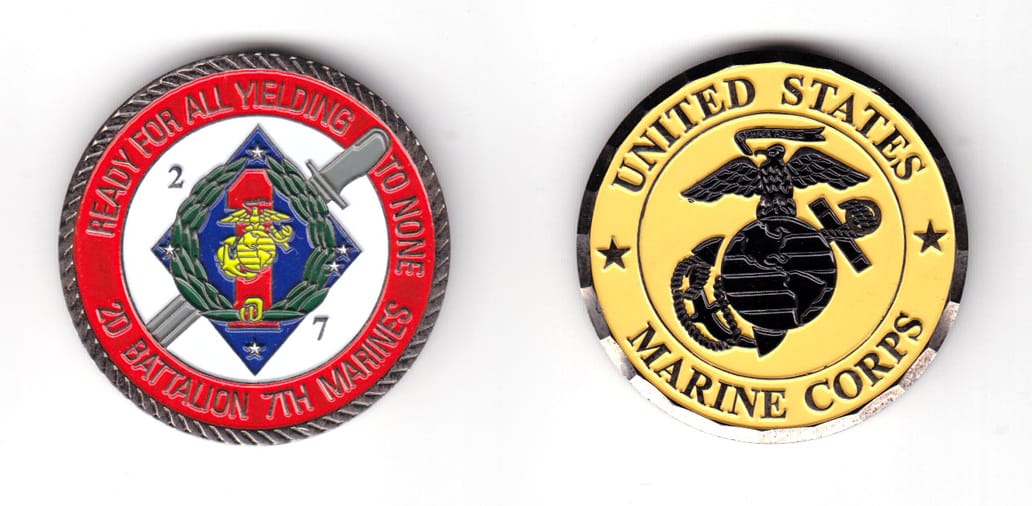 Round shaped coin, gunmetal black in color, 1 45/64 inches in diameter.