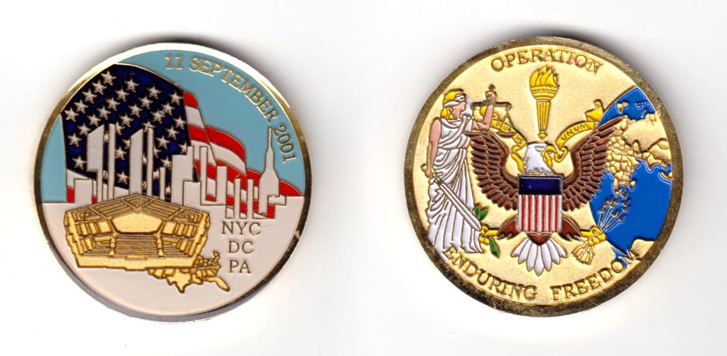 Round shaped coin, brass in color, 1 49/64 inches in diameter.