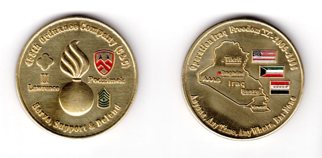 Round shaped coin, brass in color, 1 51/64 inches in diameter.