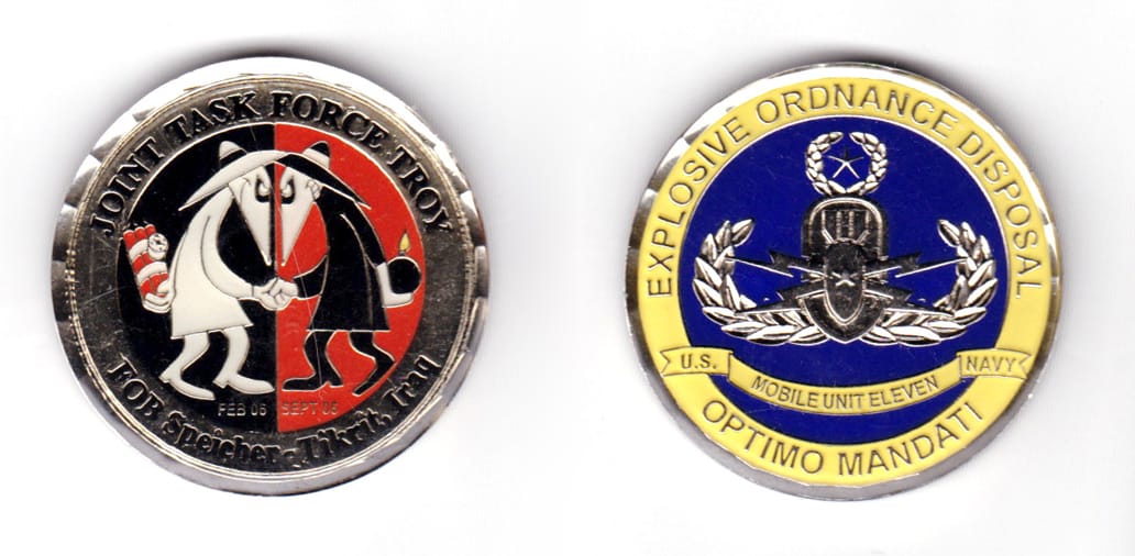 Round shaped coin, brass in color, 1 47/64 inches in diameter.