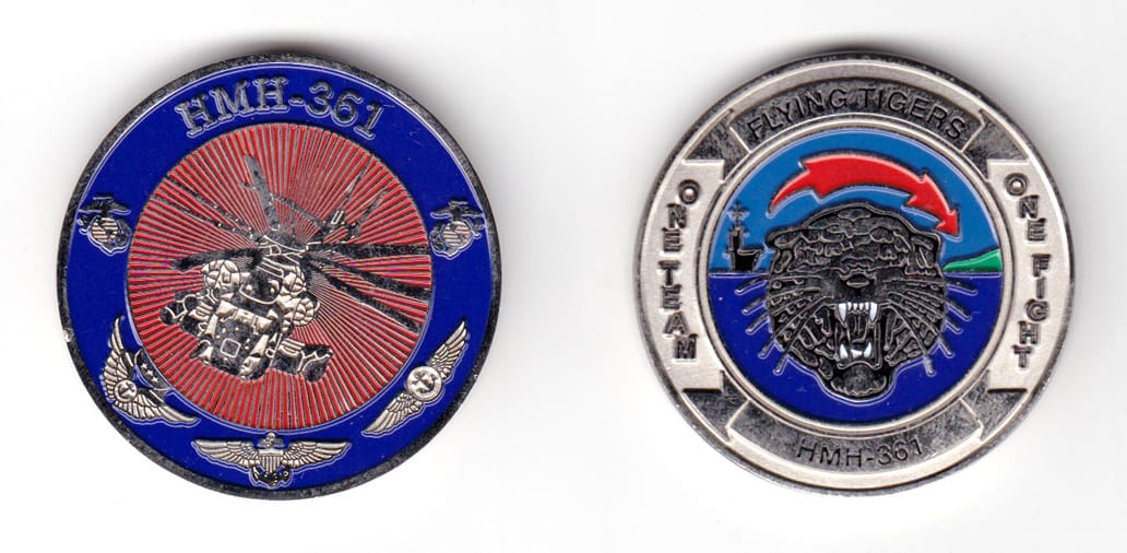 Round shaped coin, pewter in color, 1 3/4 inches in diameter.