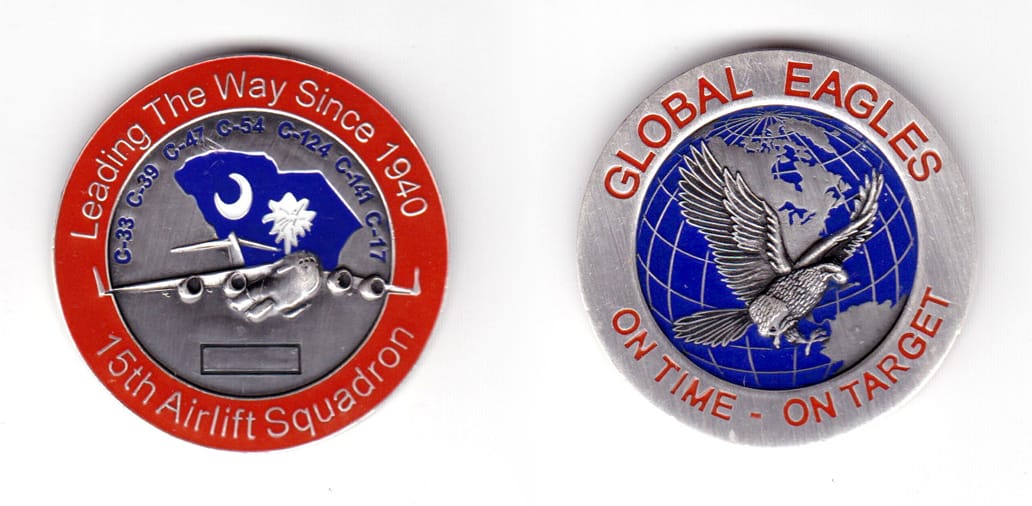 Round shaped coin, pewter in color, 1 3/4 inches in diameter.