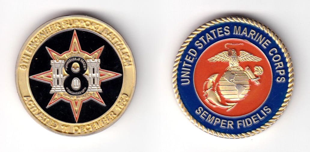 Round shaped coin, brass in color, 1 1/2 inches in diameter.