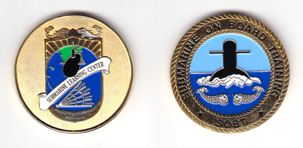 Round shaped coin, brass in color, 1 63/64 inches in diameter.