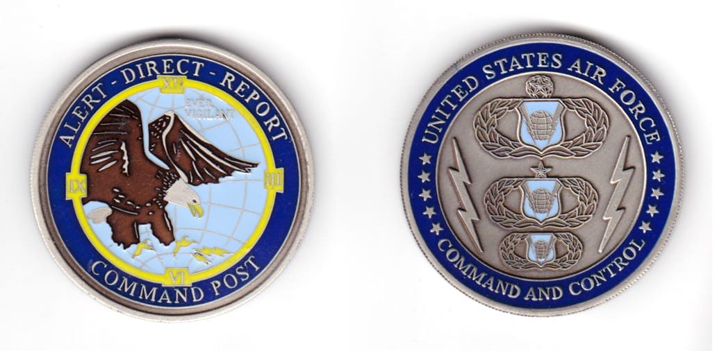 Round shaped coin, antique pewter in color, 1 49/64 inches in diameter.