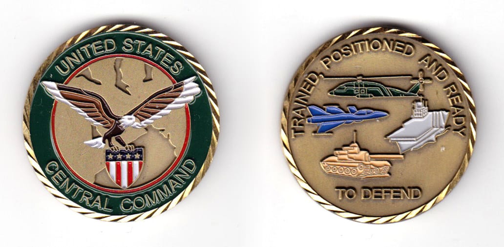 Round shaped coin, antique brass in color, 1 39/64 inches in diameter.