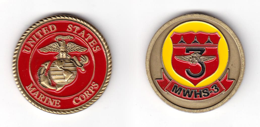 Round shaped coin, antique brass in color, 1 39/64 inches in diameter.