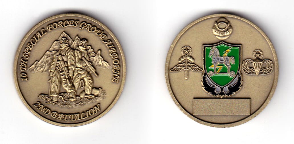 Round shaped coin, antique brass in color, 1 19/32 inches in diameter.