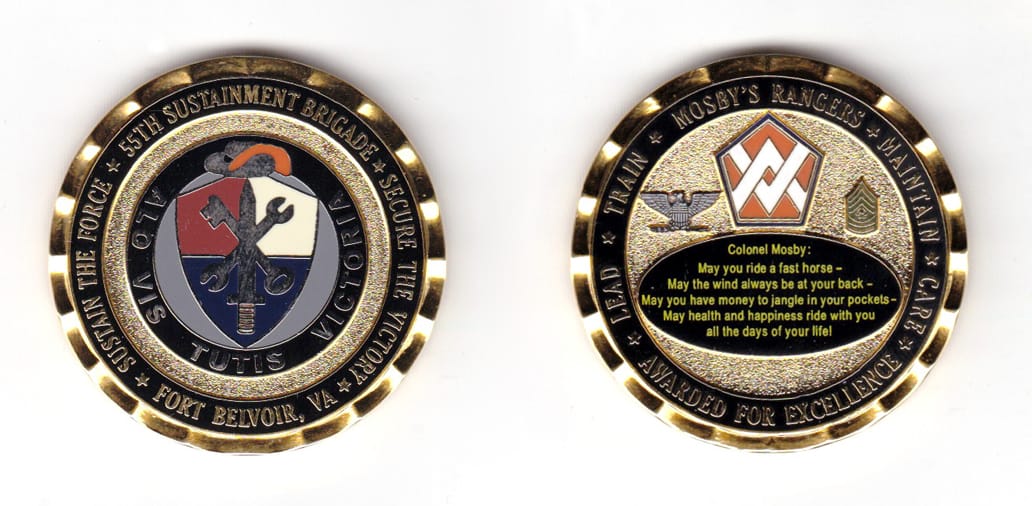 Round shaped coin, gold in color, 1 23/32 inches in diameter.