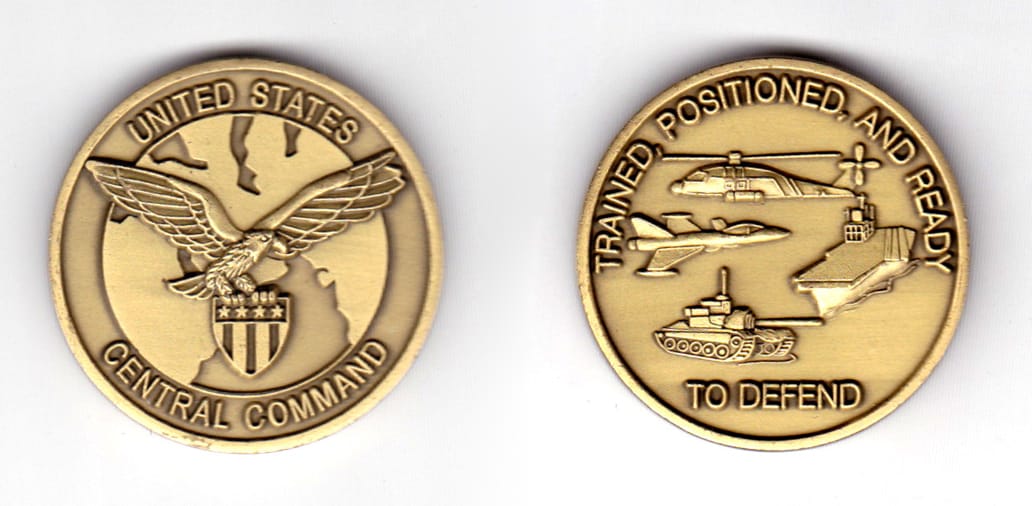 Round shaped coin, antique brass in color, 1 19/32 inches in diameter.