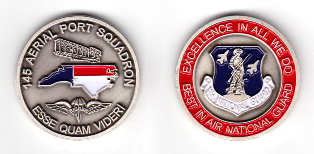 Round shaped unit, pewter in color, 1 37/64 inches in diameter.