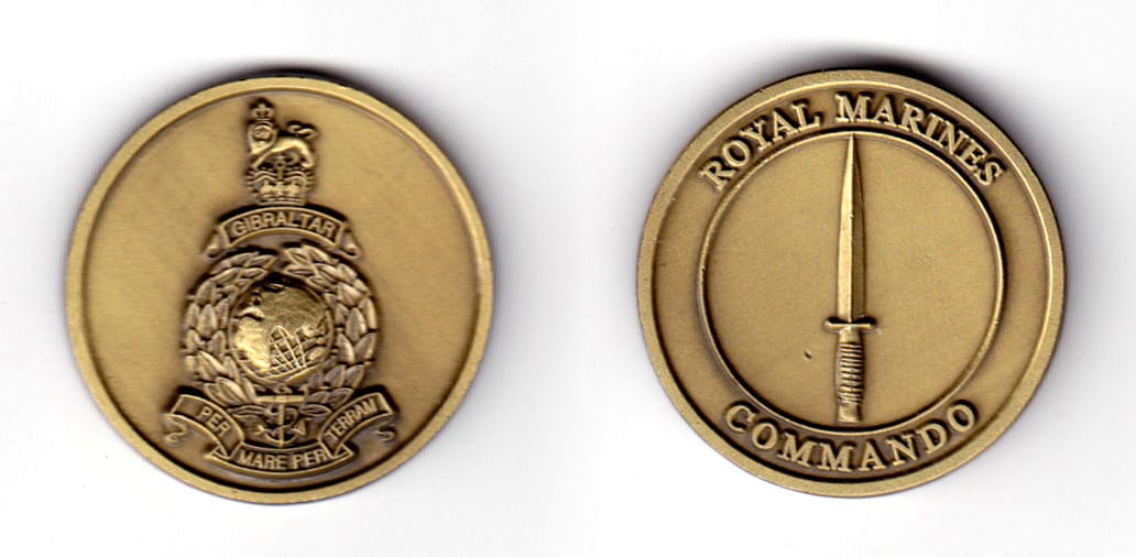 Round shaped coin, antique brass in color, 1 37/64 inches in diameter.