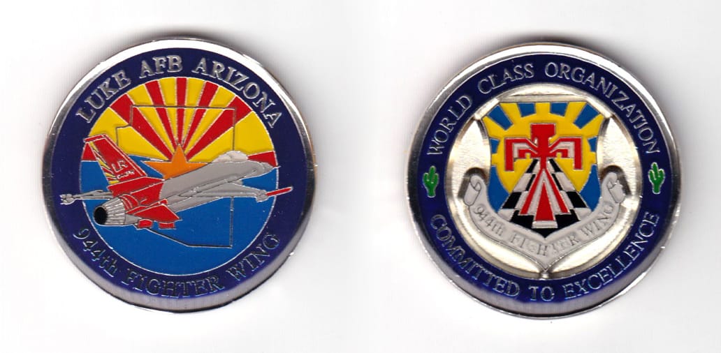 Round shaped coin, pewter in color, 1 39/64 inches in diameter.